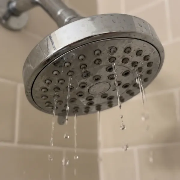 water trickling weakly from a showerhead