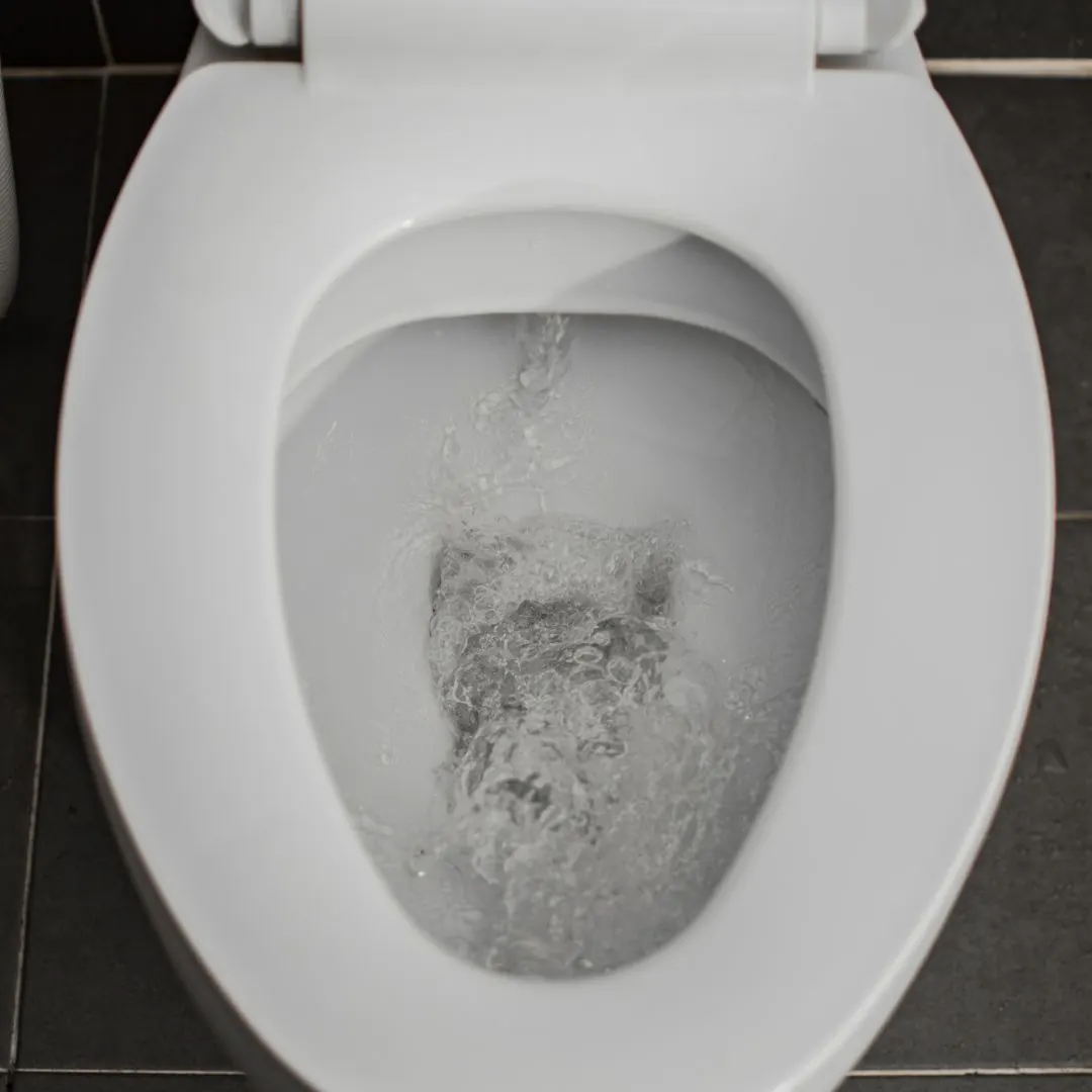 toilet flush with water swirling