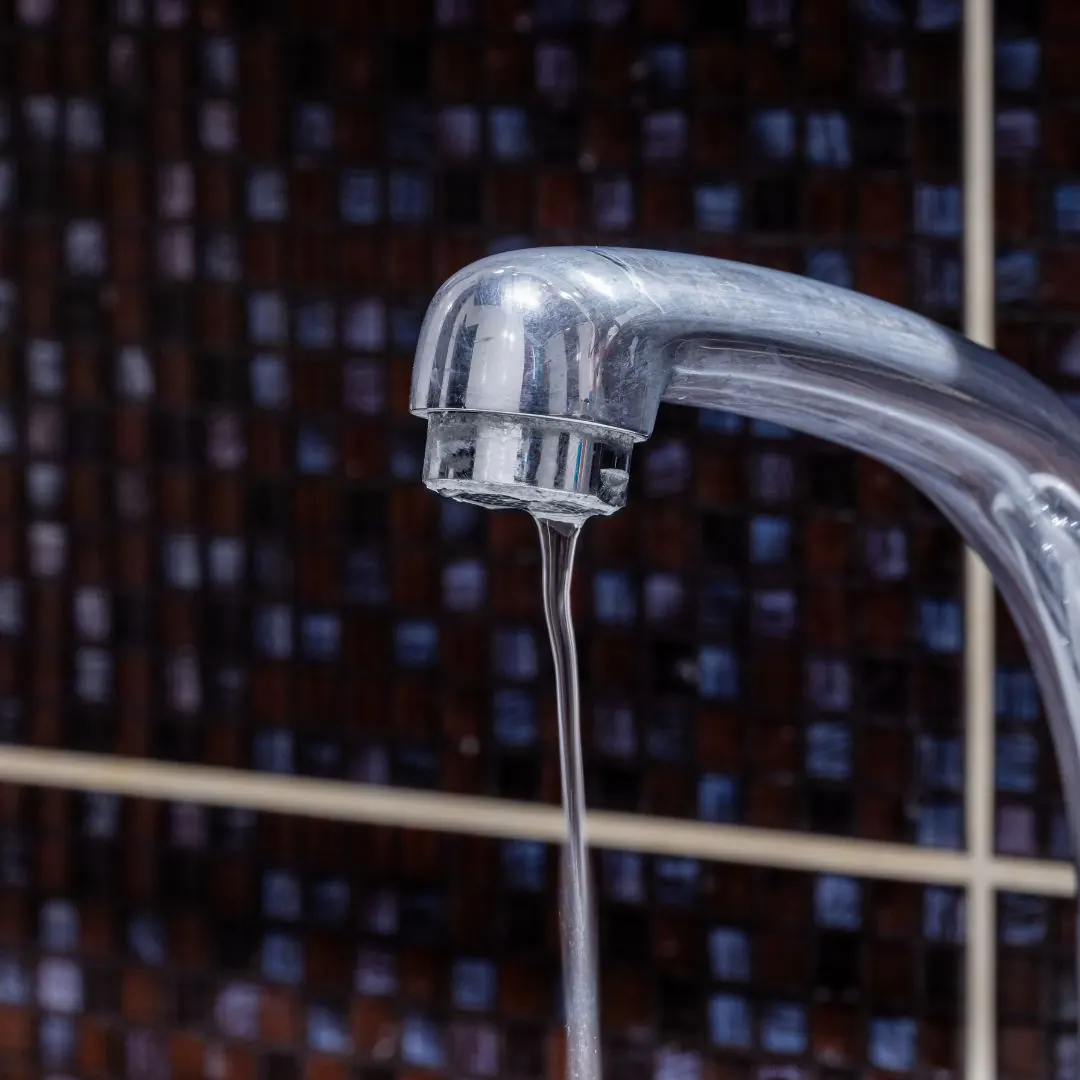 faucet with a small stream of water