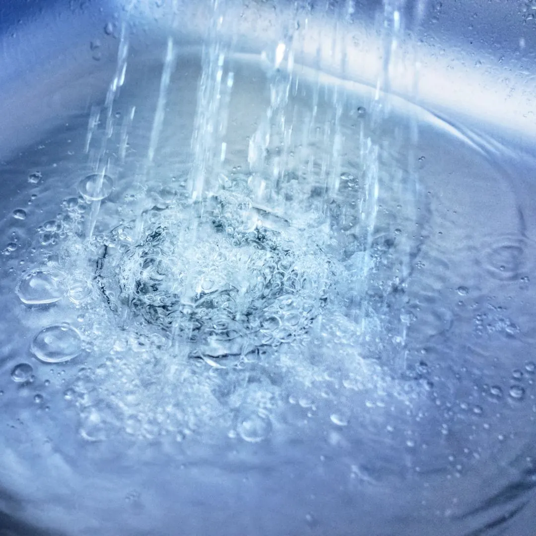 clean water runs in a sink