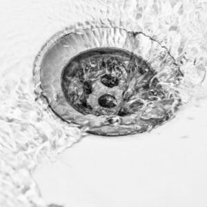 Water flowing down a drain